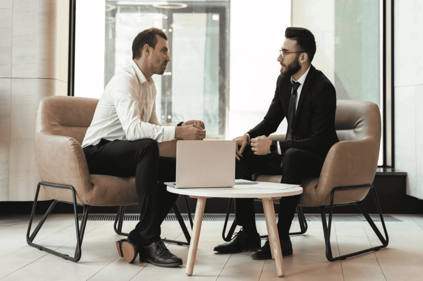 a net lease advisor discusses investment strategy with a property owner